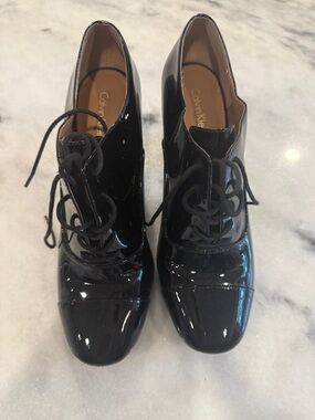 Calvin Klein Black Patent Lace-Up Booties